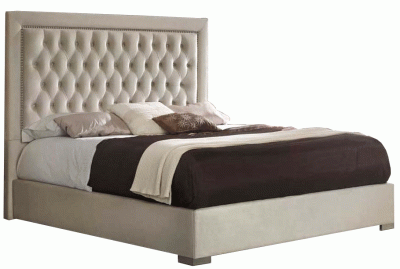 Modern Upholstered High Headboard Bed with Matching Case goods in champagne color.
